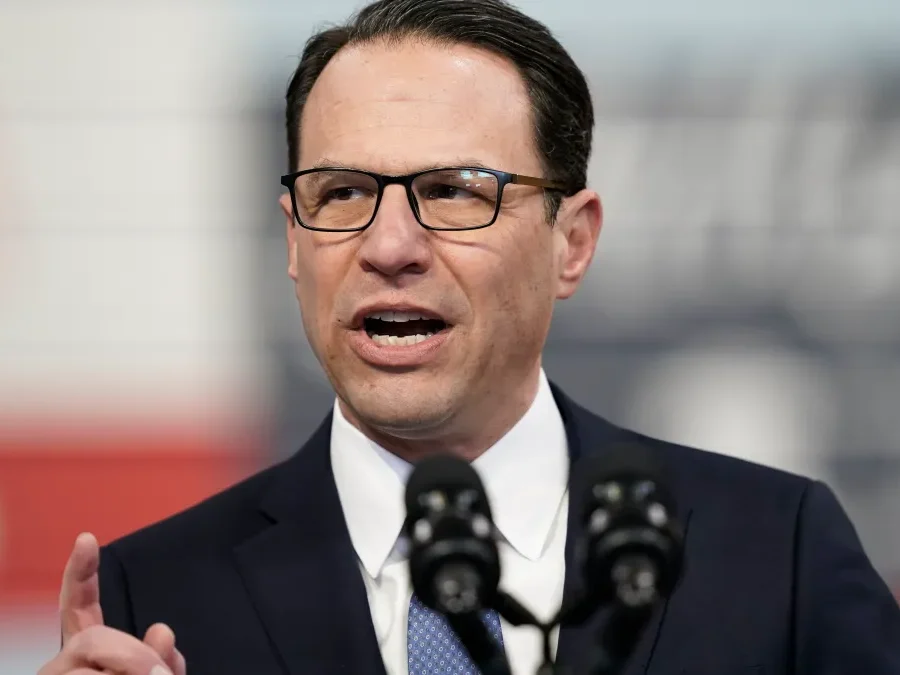 Governor Shapiro speaking at a podium.